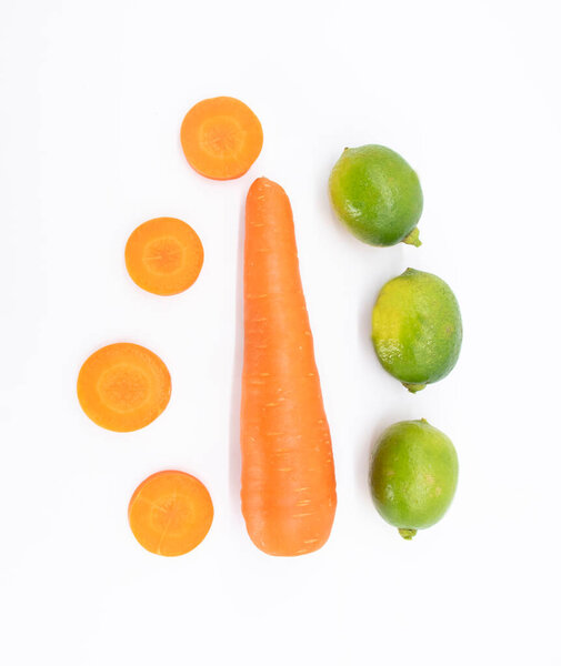 Fresh Carrot with lemon isolated on white background.top view