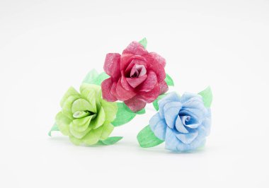 paper made rose in different color isolate on white