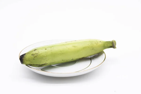 Single Banana Drop Water Plate Isolated White — Stok fotoğraf