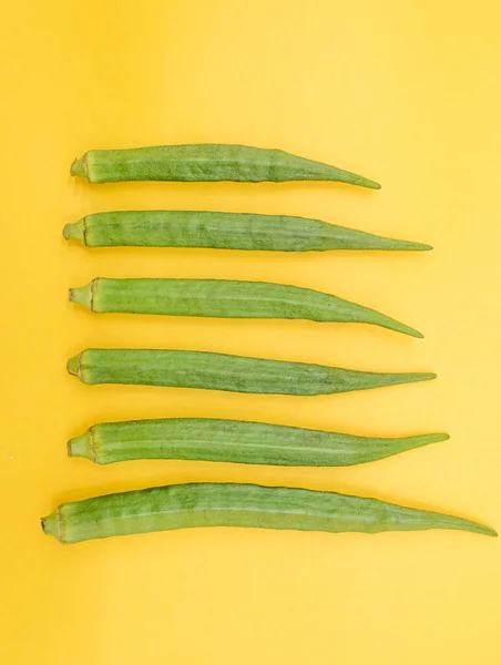 Lady Finger Isolated Yellow Background Selective Focus — Photo