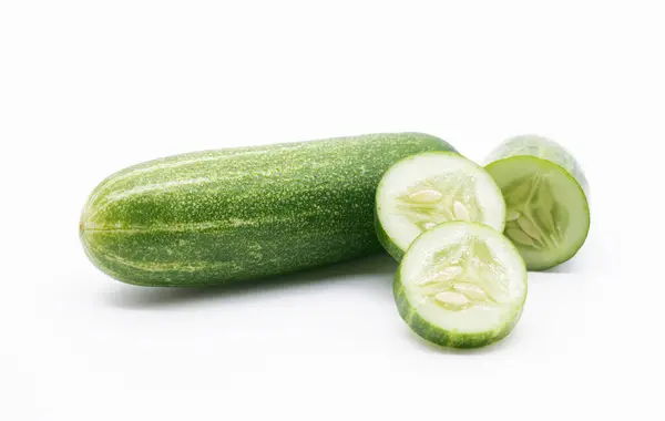Whole Cucumber Some Pieces Isolated White Background Fresh Vegetable Healthy — Foto Stock