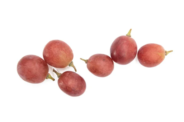 红葡萄 葡萄干在白色上被隔离了 带有剪切路径 顶视图 — 图库照片