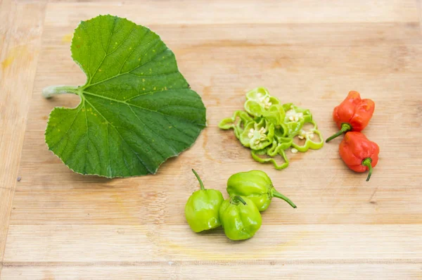 Chili Isolate Wooden Background Naga Chili Slices — Foto Stock