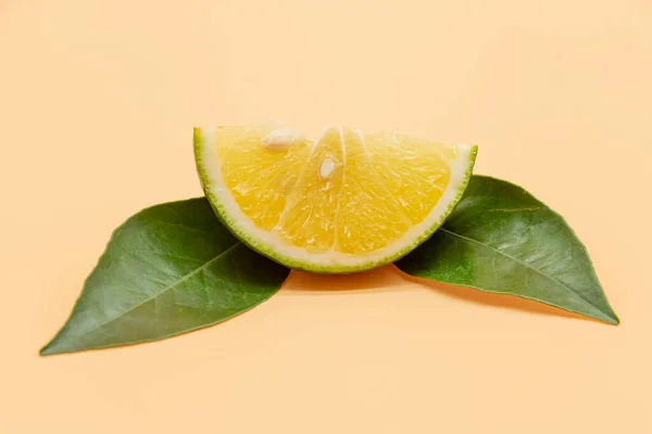 Green tangerines or Mandarin slices isolate on colorful background
