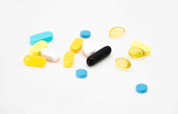 Different Pills White Background Flat Lay Selective Focus — Stok fotoğraf