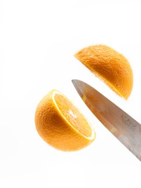 orange cut by knife isolated on white background