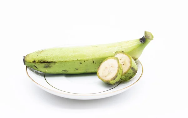 Pojedynczy Banan Plasterkach Białym Talerzu — Zdjęcie stockowe