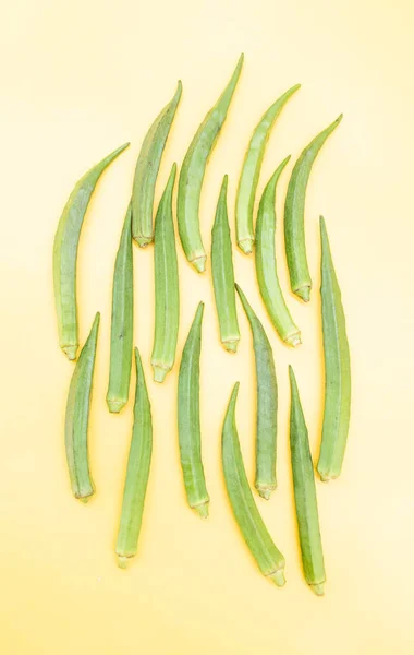 Lady Finger Okra Isolated Yellow Background Fresh Cooking Ingredient Top — Stockfoto