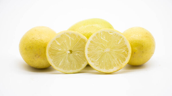 selective focus, Lemon pieces isolated on white background