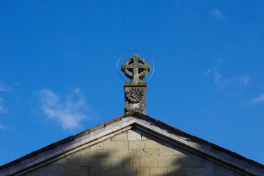 Sanctuary of Santa Maria di Canneto - Roccavivara - Molise: Detail of the raised circled cross on the roof spire