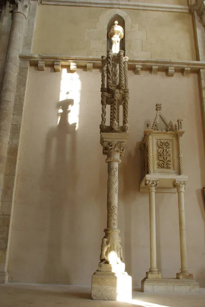 Manoppello - Abruzzo - Abbey of Santa Maria d\'Arabona - The  stone tabernacle leaning against the wall and the precious candelabrum where the Easter candle is placed