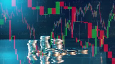 Coins are getting added to a pile on a display with stock rates