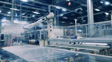 Robotic transportation of solar panels in the factory