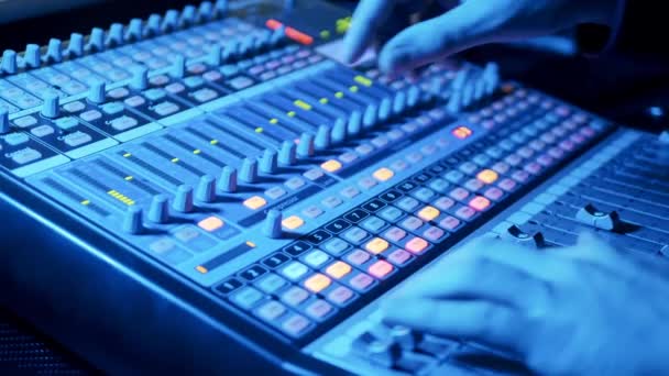 A person is operating a mixing console — Stock Video