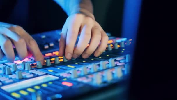 Close Male Hands While Operating Mixing Console — Stock Video