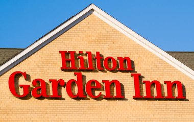 Enfield, Canada - July 10, 2017: Hilton Hotels & Resorts is a worldwide brand of hotels and resorts. It is the main brand of Hilton. clipart