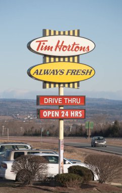 TRURO, CANADA - DECEMBER 30, 2014: Tim Hortons Sign. Tim Hortons is a Canadian restaurant chain known for its coffee and doughnuts. In 2014 Burger King purchased Tim Hortons for 11.4 billion $US.