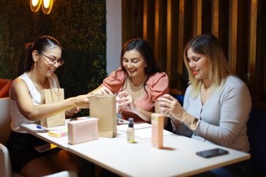 Entrepeneur Women Packing Products of Business Smiling. High quality photo
