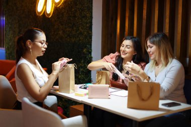 Entrepeneur Women Packing Products of Business Smiling. High quality photo