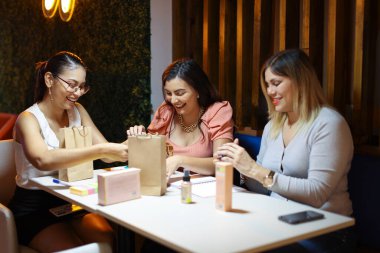 Entrepeneur Women Packing Products of Business Smiling. High quality photo