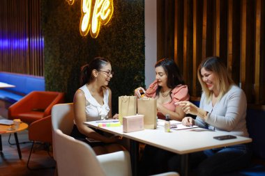 Entrepeneur Women Packing Products of Business Smiling. High quality photo