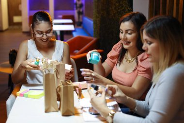 Entrepeneur Women Packing Products of Business Smiling. High quality photo