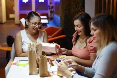 Entrepeneur Women Packing Products of Business Smiling. High quality photo