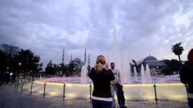 Time lapse of the Blue Mosque, Istanbul, Turkey, behind fountains, on a cloudy evening