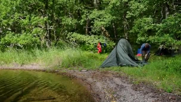 Time Lapse Man Setting Tent Lakeside Loch Ness Caledonian Canal — Stock video