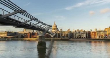 London Hyperlapse Timelapse, Hyper Lapse Time Lapse of St Pauls Cathedral and Millennium Bridge, the Central London iconic landmark with clear blue sky and River Thames in England, UK