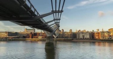 London Hyperlapse Timelapse, Hyper Lapse Time Lapse of St Pauls Cathedral and Millennium Bridge, the Central London iconic landmark with clear blue sky and River Thames in England, UK