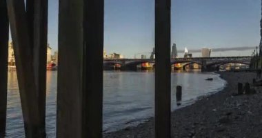 London Hyperlapse Timelapse, Hyper Lapse Time Lapse of The City in Central London showing with St Pauls Cathedral behind the River Thames in England, UK