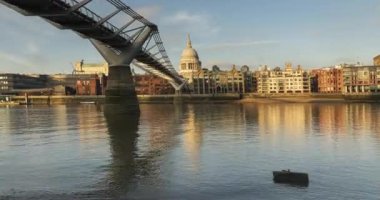 London Hyperlapse Timelapse, Hyper Lapse Time Lapse of St Pauls Cathedral and Millennium Bridge, the Central London iconic landmark with clear blue sky and River Thames in England, UK