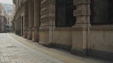 Empty roads and quiet streets with almost no people and no traffic during the Coronavirus pandemic Covid-19 lockdown, taken at rush hour at Bank in the City of London, England, Europe