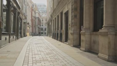 Empty roads and quiet streets with almost no people and no traffic during the Coronavirus pandemic Covid-19 lockdown, taken at rush hour at Bank in the City of London, England, Europe