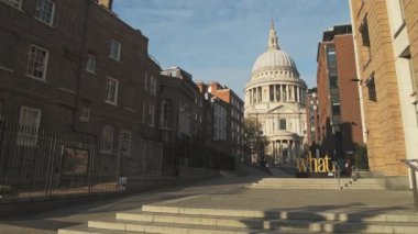 London landmark of St Pauls Cathedral in Covid-19 Coronavirus lockdown, with quiet empty roads at the popular tourist attraction during the pandemic in England, Europe