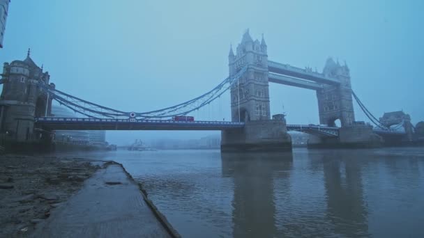 Red London Bus Driving Tower Bridge Misty Cool Blue Atmospheric — Stockvideo