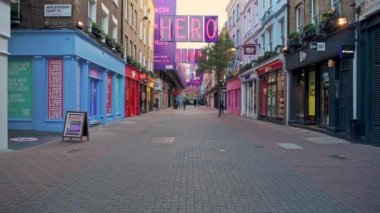 Empty London Roads during Covid-19 Lockdown at quiet, deserted Carnaby Street in Soho, a popular tourist area during the global pandemic Coronavirus shutdown in England, Europe