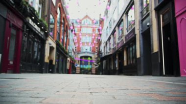 Empty London Roads during Coronavirus Lockdown at quiet, deserted Carnaby Street in Soho, a popular tourist area during the global pandemic Covid-19 shutdown in England, Europe