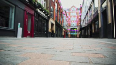 Empty London Roads during Covid-19 Lockdown at quiet, deserted Carnaby Street in Soho, a popular tourist area during the global pandemic Coronavirus shutdown in England, Europe