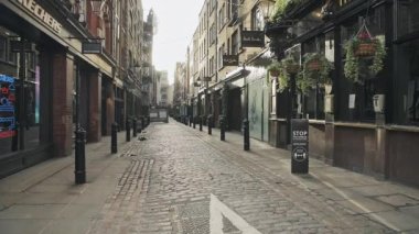 Covent Garden in London in Coronavirus lockdown, with empty streets, quiet deserted roads, no people and closed shops shut in a popular tourist area during the Covid-19 pandemic in England, Europe