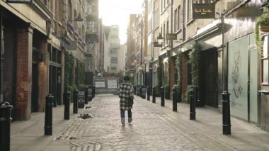 Covent Garden in London in Coronavirus lockdown, with empty streets, quiet deserted roads, no people and closed shops shut in a popular tourist area during the Covid-19 pandemic in England, Europe