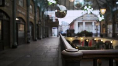 London in Coronavirus Covid-19 lockdown with empty streets, quiet deserted roads, no people and closed shops shut at Covent Garden market, a popular tourist area during the pandemic in England, Europe