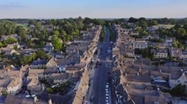 UK Housing Market, Aerial Drone View of Houses in Village of Burford in Cotswolds, England, a Popular English Picturesque Tourist Destination in Gloucestershire