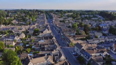 UK Housing Market, Aerial Drone View of Houses in Village of Burford in Cotswolds, England, a Popular English Picturesque Tourist Destination in Gloucestershire