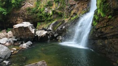 Nauyaca Waterfalls in Costa Rica, Rainforest Landscape Scenery of a Powerful Drop into a Pool, with the Potential to Produce Renewable Hydro Powered Electricity and Energy