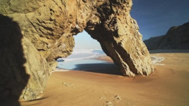 Lisbon Beach and Dramatic Portugal Coast with Arch Rock Formation, Beautiful Coastal Scenery and Landscape at Praia da Adraga, Sintra, Portugal, Europe, Atlantic Ocean