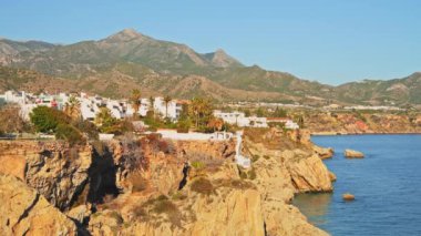 Aerial Drone View of Beautiful Beach on Mediterranean Coast of Spain at Nerja, Costa Del Sol in Andalusia (Andalucia), Mountains and Blue Ocean Sea Water on Sunny Day With Clear Blue Sky in Europe