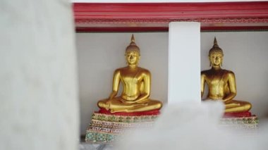 Gold Buddha Statues in Bangkok, Thailand, Beautiful Buddhist Temple Detail at Wat Pho (Temple of the Reclining Buddha), a Popular Famous Tourist Attraction and Destination