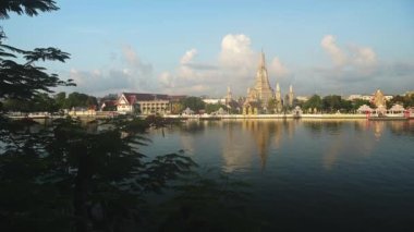 Bangkok Beautiful City Scene, Chao Phraya River and Wat Arun Buddhist Temple Cityscape, a Famous Building in Southeast Asia with Amazing Light, Background with Copyspace